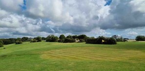 Enjoy a round of golf on our lush, open green.