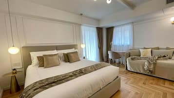 Superior suite, 1 slaapkamer, niet-roken | 1 slaapkamer, luxe beddengoed, donsdekens
