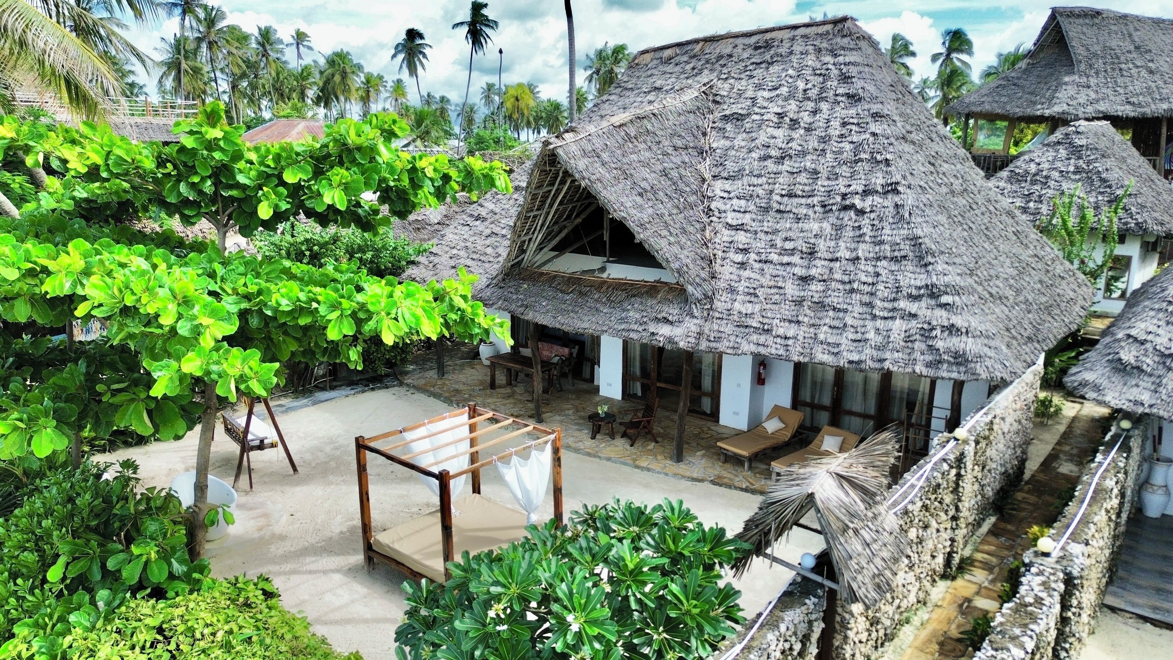 Superior villa, bad, uitzicht op zee | Een bureau, beddengoed