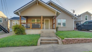 A single-story house with a front porch, a small front yard, and a driveway. - 3 Mi to Baylor U: Home w/ Shared Yard (Waco)