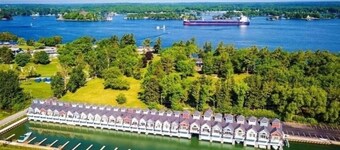 Condo and private boathouse on tranquil bay with marina access