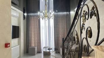 20-inch flat-screen TV with cable channels, TV