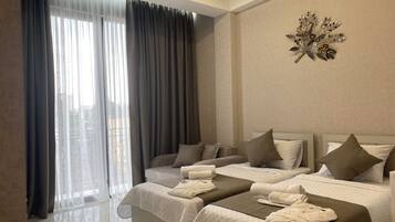 Frette Italian sheets, premium bedding, down comforters