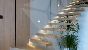 Family Villa | Living area | 80-inch Smart TV with satellite channels, TV, Netflix