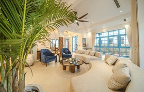 Signature Villa | Living area | 80-inch Smart TV with satellite channels, TV, Netflix - Sun Grand Feria (Ha Long)