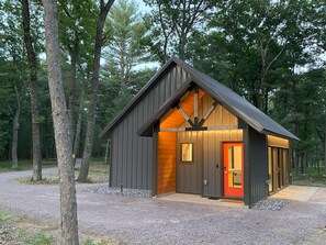 Exterior - Raccoon Cabin @ Orange Tractor Retreat: a new, modern cabin on 40 private acres (Wisconsin Dells)