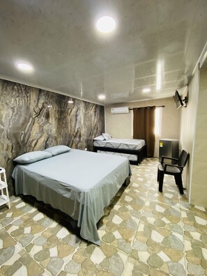 Habitación cuádruple | Minibar, bed sheets - Posada Gladys Place (San Andrés)