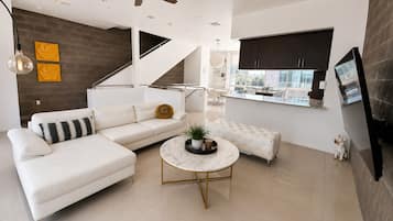 Premium Apartment | Living area | Flat-screen TV