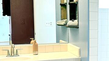 Hair dryer, towels, soap, shampoo