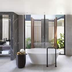 Separate tub and shower, rainfall showerhead, eco-friendly toiletries