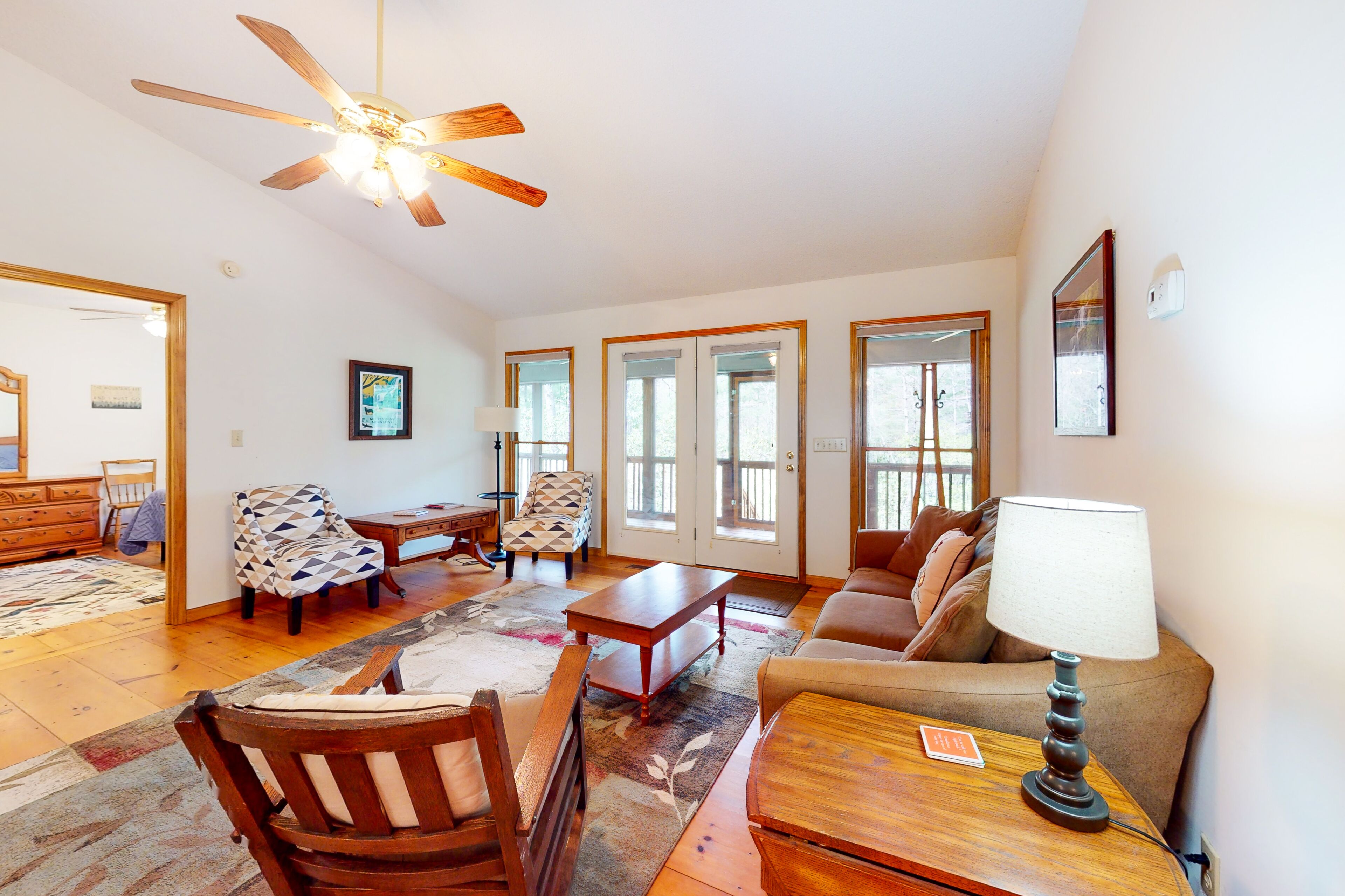 Mountainside abode with a wood stove, firepit, grill, sunroom, AC, and W/D