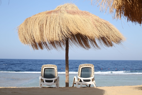 Private beach, beach umbrellas, beach towels, snorkeling