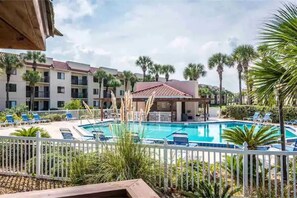 Outdoor pool, a heated pool - Premier 1st floor condo in Ocean Village Club w/ heated pool, tennis, eats (St. Augustine Beach)
