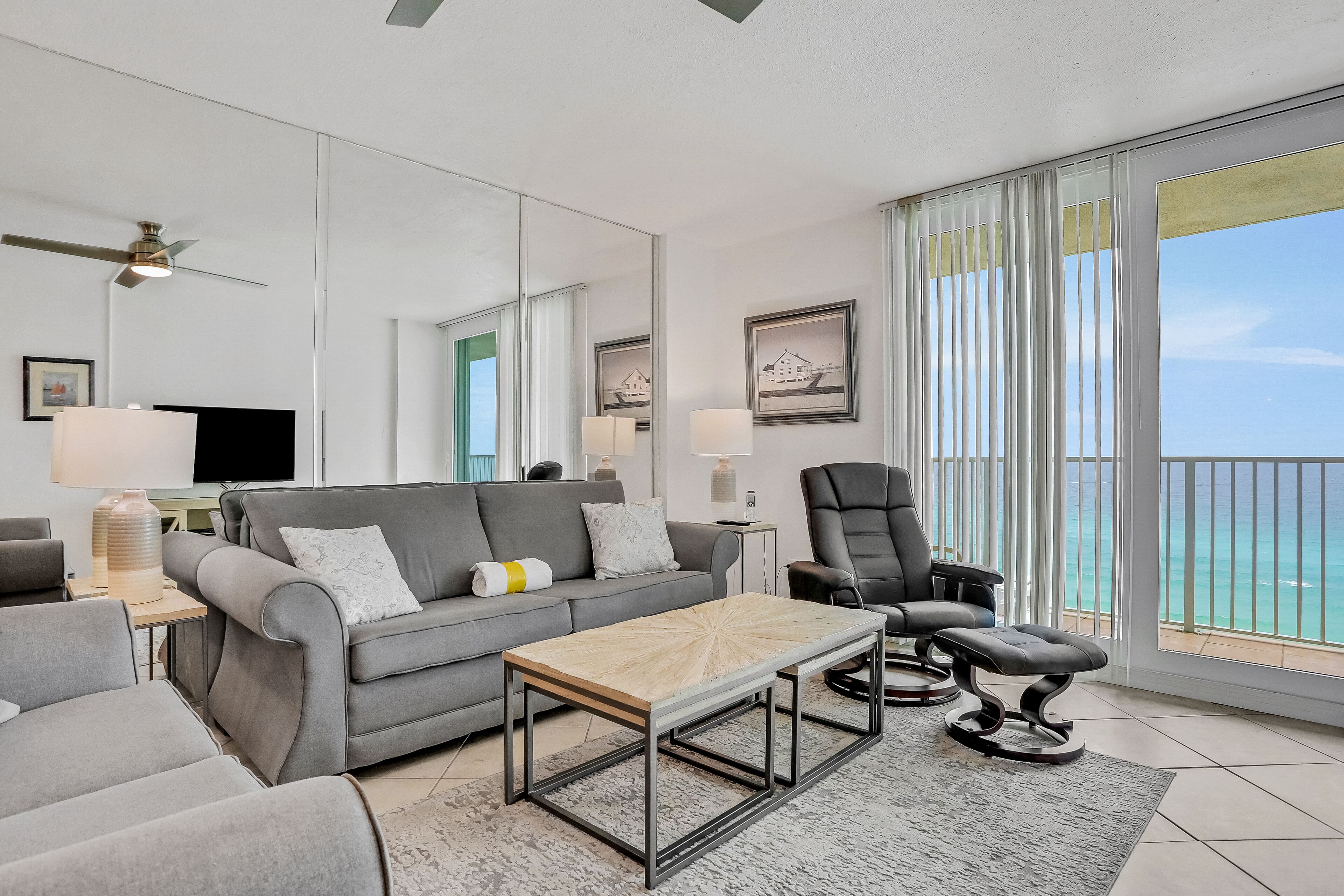 Oceanfront condo with bright interior, balcony, W/D, & AC - pool access
