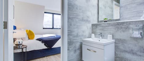 Apartment, Multiple Beds | Bathroom | Separate tub and shower, deep soaking tub, free toiletries, hair dryer