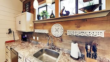 Fridge, coffee/tea maker, cookware/dishes/utensils