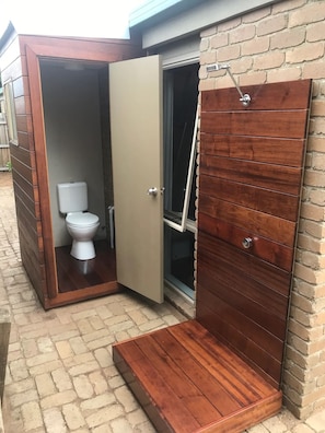 Shower, eco-friendly toiletries, hair dryer, towels