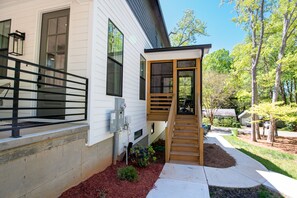 Stroll through the serene surroundings of this two-story home, featuring a spacious interior and beautifully manicured lawn.