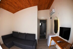 Deluxe-Zimmer, 1 Schlafzimmer, Nichtraucher, Gartenblick | Wohnbereich