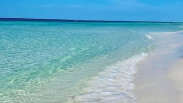 Beach nearby, sun loungers, beach towels