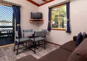Spa Cabin - Sleeps 2 | Living area | TV, DVD player