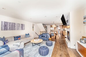 TV, fireplace, books - Charming 3BR condo steps to hiking w/ private decks and mountain views (Telluride)
