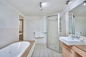 Bathtub, hair dryer, towels