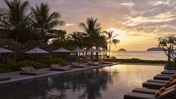 Outdoor pool, open 8:00 AM to 8:00 PM, free pool cabanas, pool umbrellas