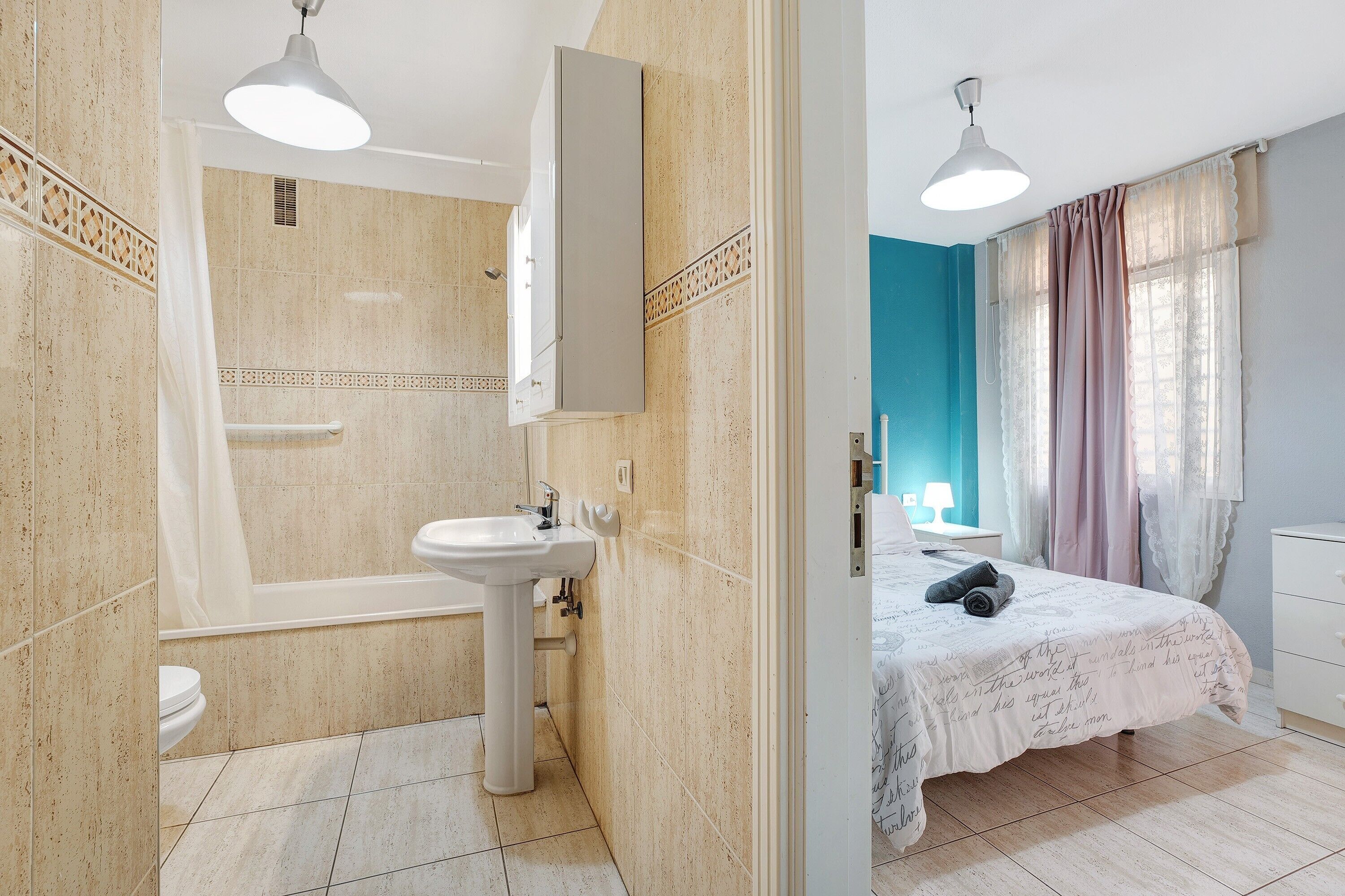 Bathtub, hair dryer, towels