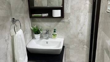 Shower, free toiletries, hair dryer, towels