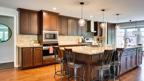 Fridge, microwave, oven, stovetop - Evergreen Retreat | 15 Guests | Theater | Rock Wall | Hot Tub | Fenced Yard | Sports Court | Sauna (Ravenna)