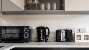 Apartemen | Dapur pribadi | Lemari es, microwave, oven, dan kompor
