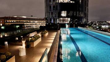 Outdoor pool, an infinity pool, sun loungers