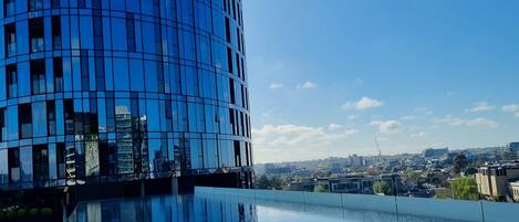 Outdoor pool, an infinity pool, pool loungers