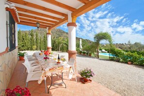 Outdoor dining - A captivating retreat with pool for an exceptional group holiday. Pet friendly. (Comares)