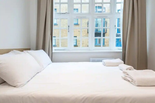 Basic Apartment, Multiple Beds | 1 bedroom, iron/ironing board, bed sheets