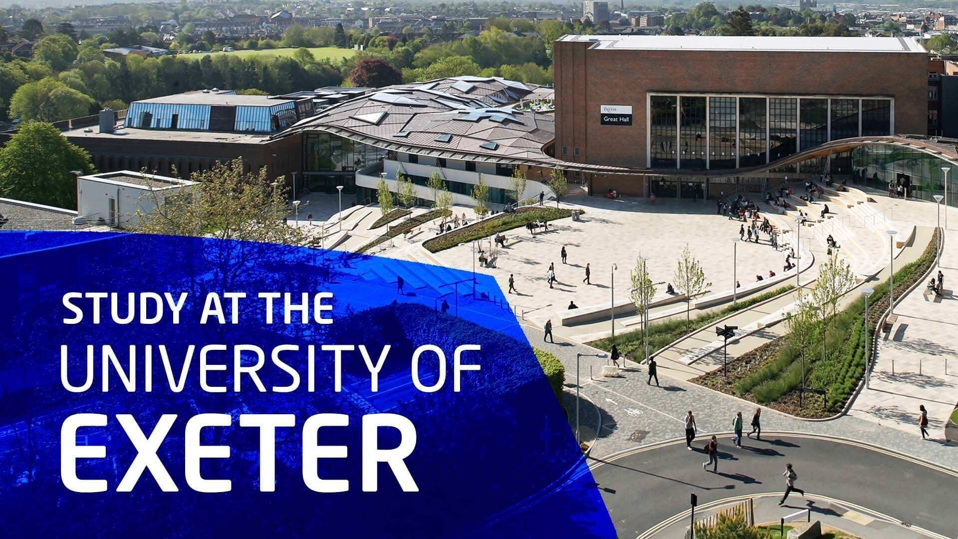 A university campus with modern architecture, including a building labeled "Great Hall" and a large open plaza with people walking.