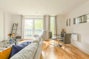 Basic Apartment, 2 Double Beds | Living area | TV