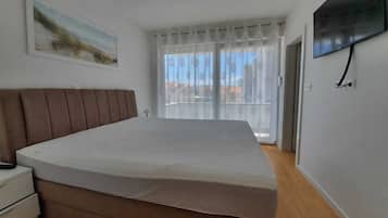 2 quartos, ferros/tábuas de passar roupa, Wi-Fi de cortesia