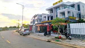 A modern hotel with a coffee shop named 'Seaside Coffee' on the ground floor. - Seaside Hotel (Rach Gia)