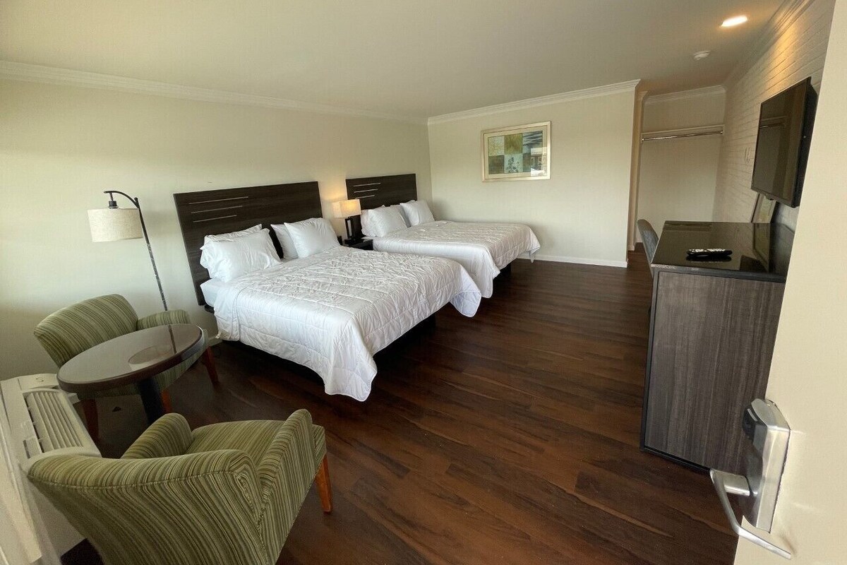 Blackout drapes, iron/ironing board, WiFi (free), bed sheets