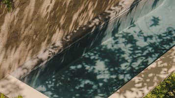 Indoor pool, outdoor pool, open 10:30 AM to 8:00 PM, pool umbrellas