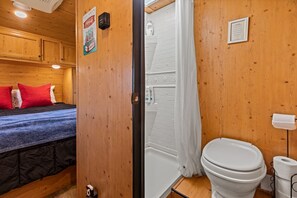 Shower, hair dryer, soap, toilet paper