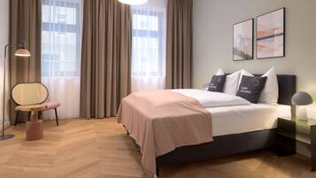 Two-Bedroom Economy Suite | 2 bedrooms, individually decorated, individually furnished, desk