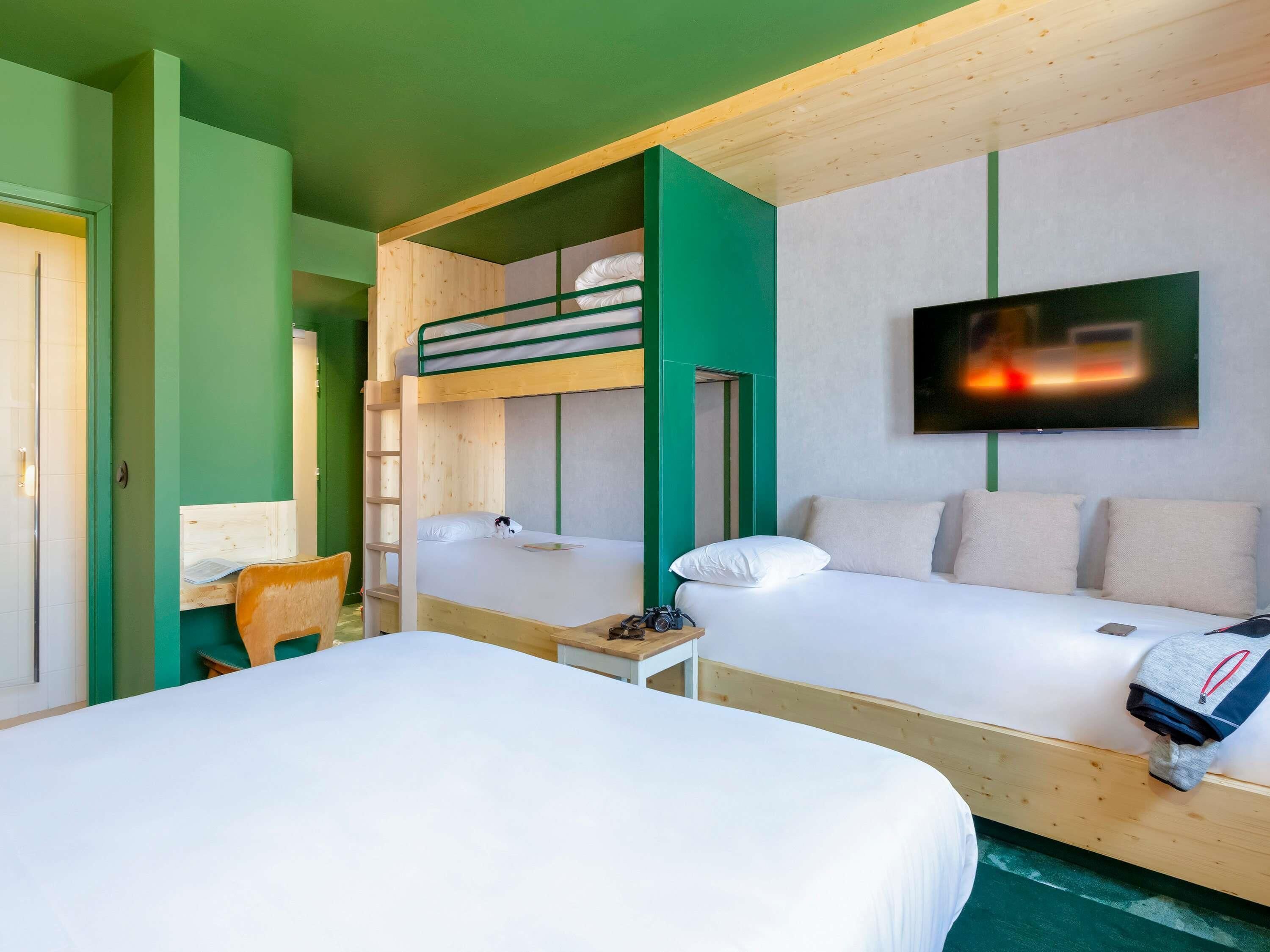 Family Room (Pop. 5 people) | Premium bedding, laptop workspace, soundproofing, iron/ironing board