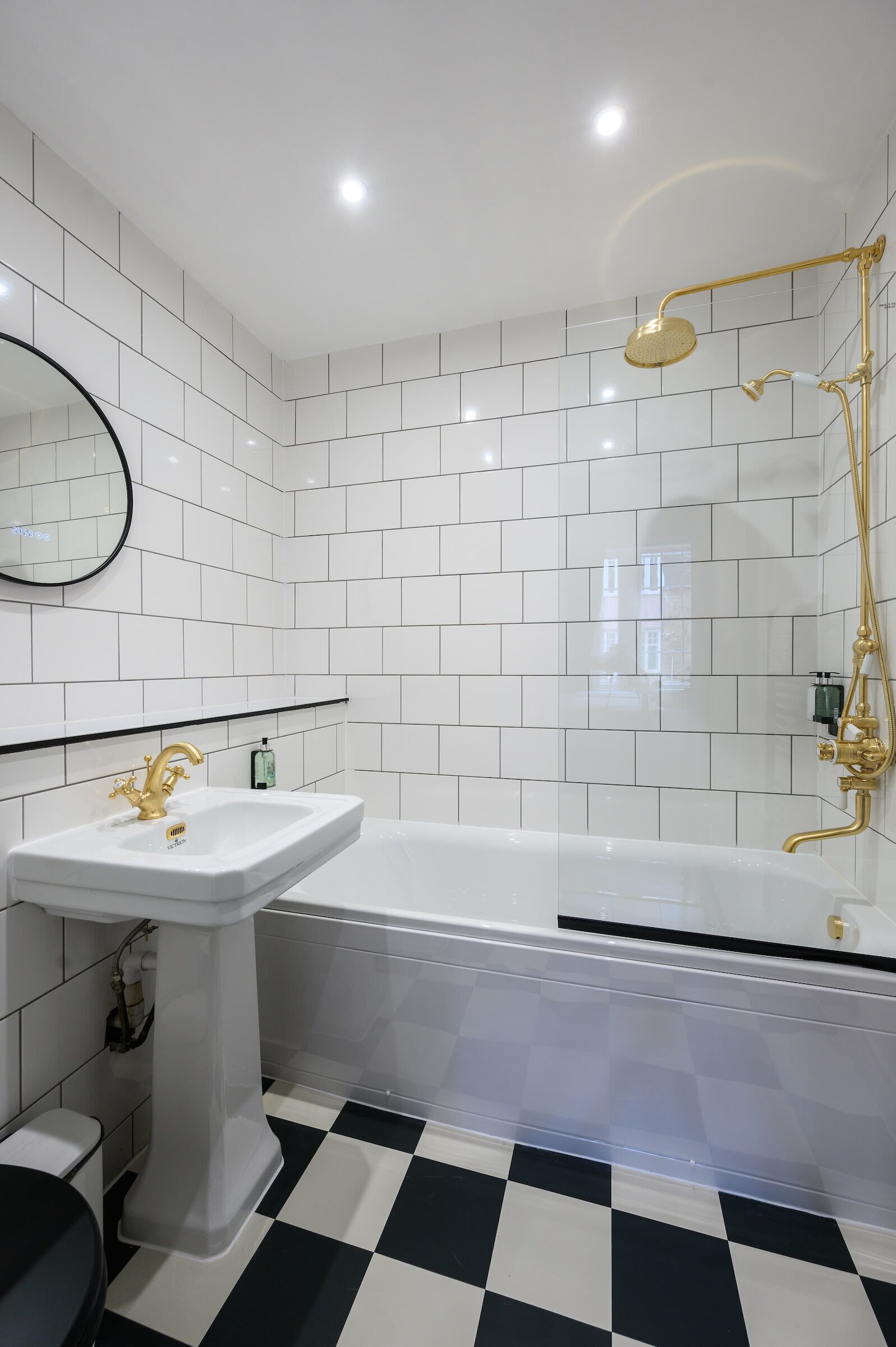 Bathtub, hair dryer, towels