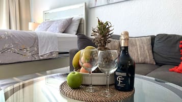 Comfort Condo | Living area | 32-inch Smart TV with cable channels, TV