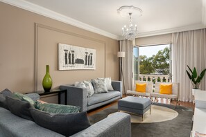 Exclusive Apartment | Living area | 40-inch flat-screen TV with cable channels, TV, Netflix - Cape Royale 202 (Cape Town)