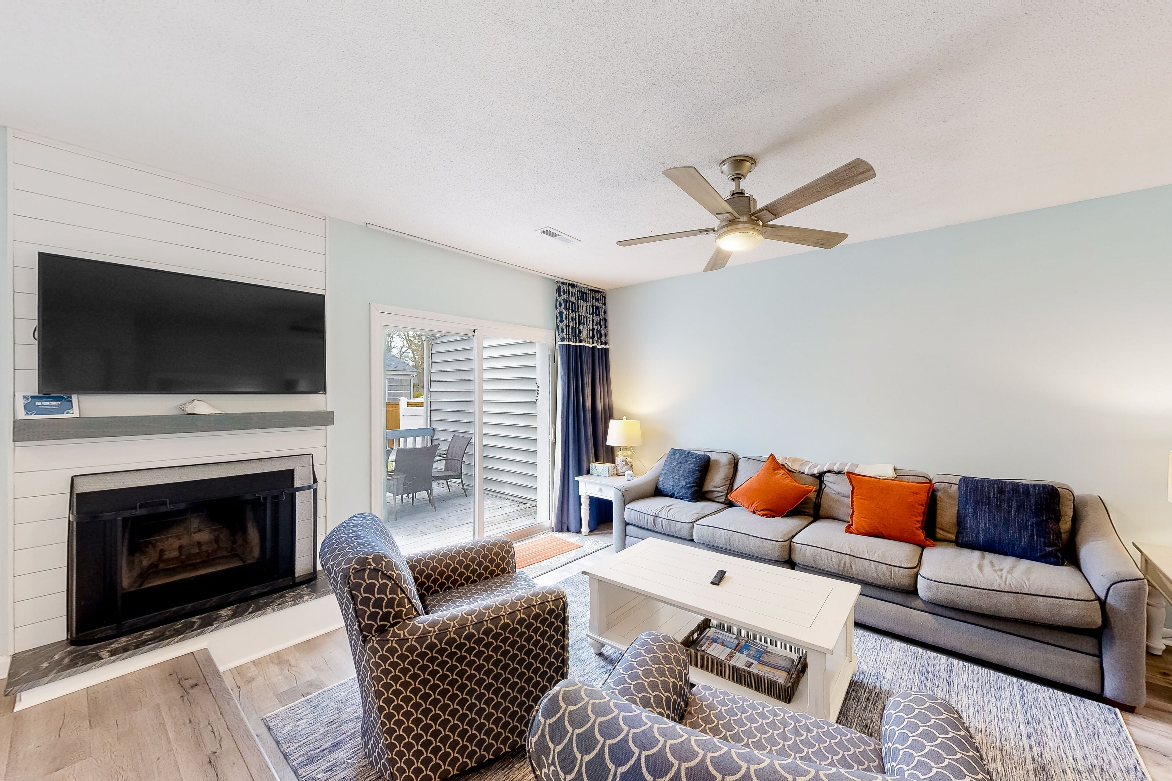 Town of Dewey Beach home with fireplace, gas grill, deck, W/D, & full kitchen