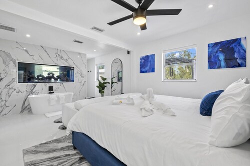 Luxury family friendly WATERFRONT home with a POOL, PLAYGROUND, FIREPIT & BEACH 